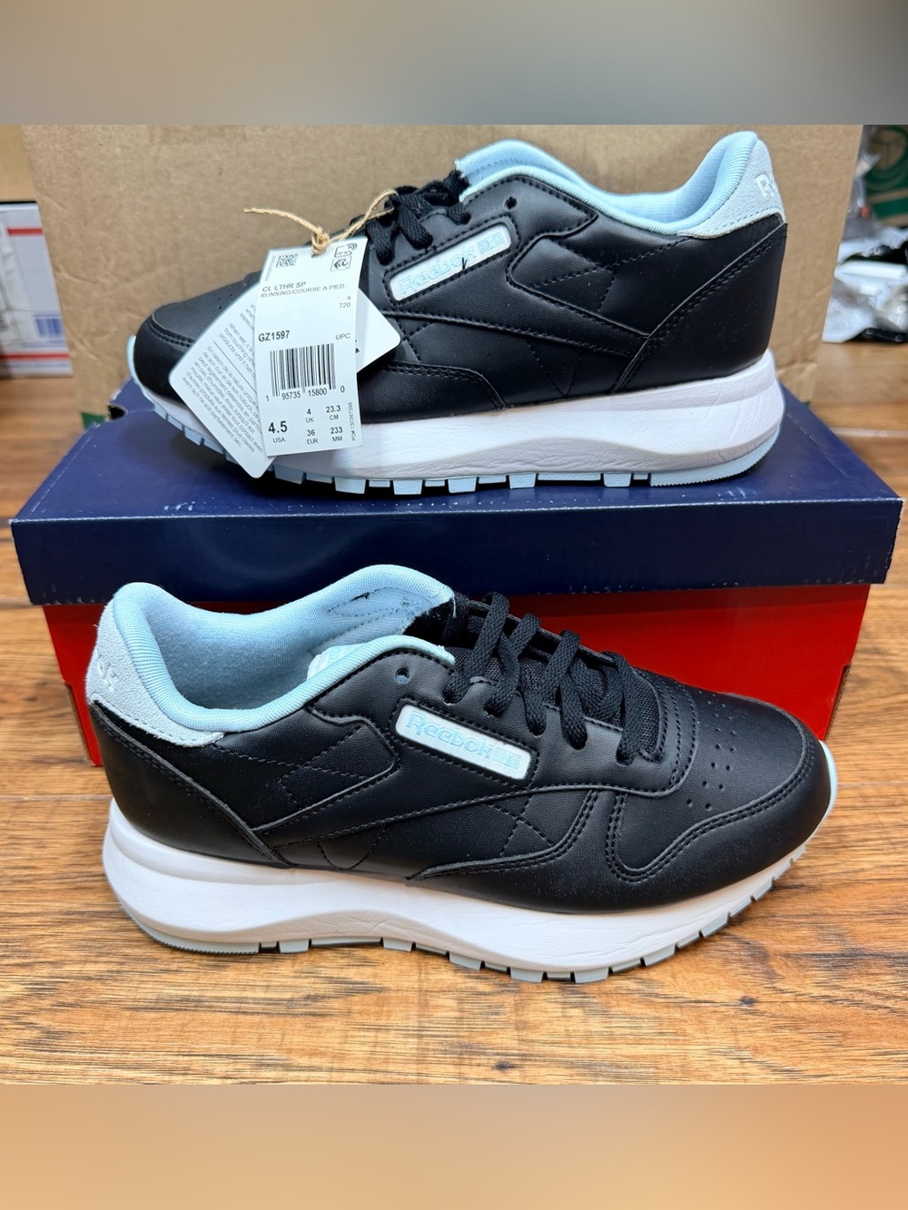 Reebok Black Sneakers with Light Blue Accents